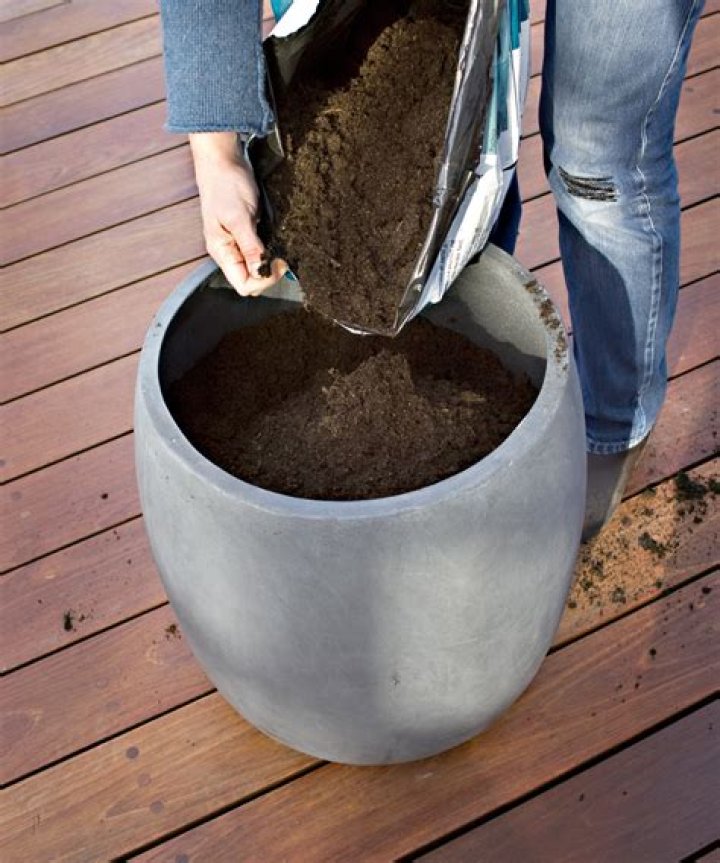 Can I put sand in the bottom of a planter?