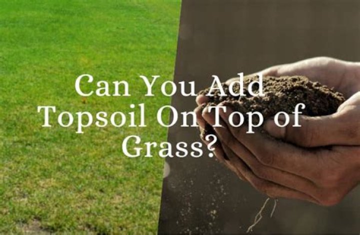 Can I put topsoil over existing lawn?