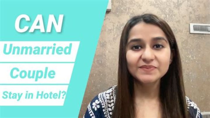 Can unmarried couples share a room in Qatar?