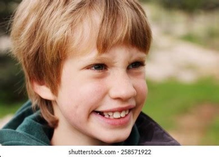 Do autistic children smile?