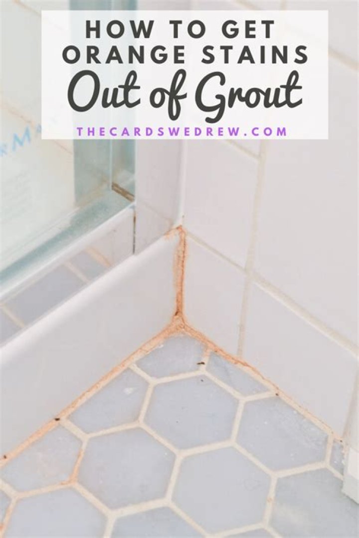 How do you get orange mold out of shower grout?