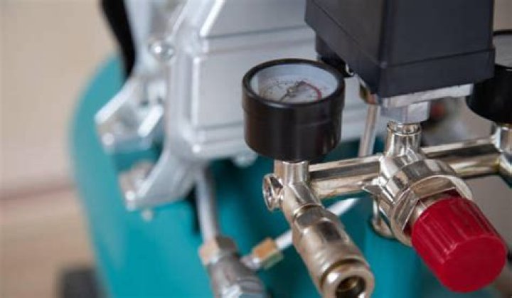 How do you inspect an air compressor?