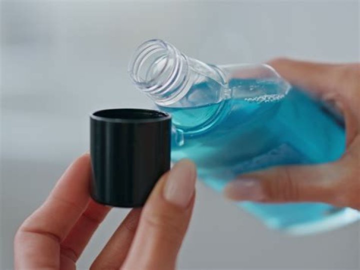 What are the dark spots when you spit out mouthwash?