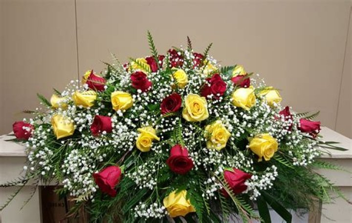 What do yellow flowers mean at a funeral?