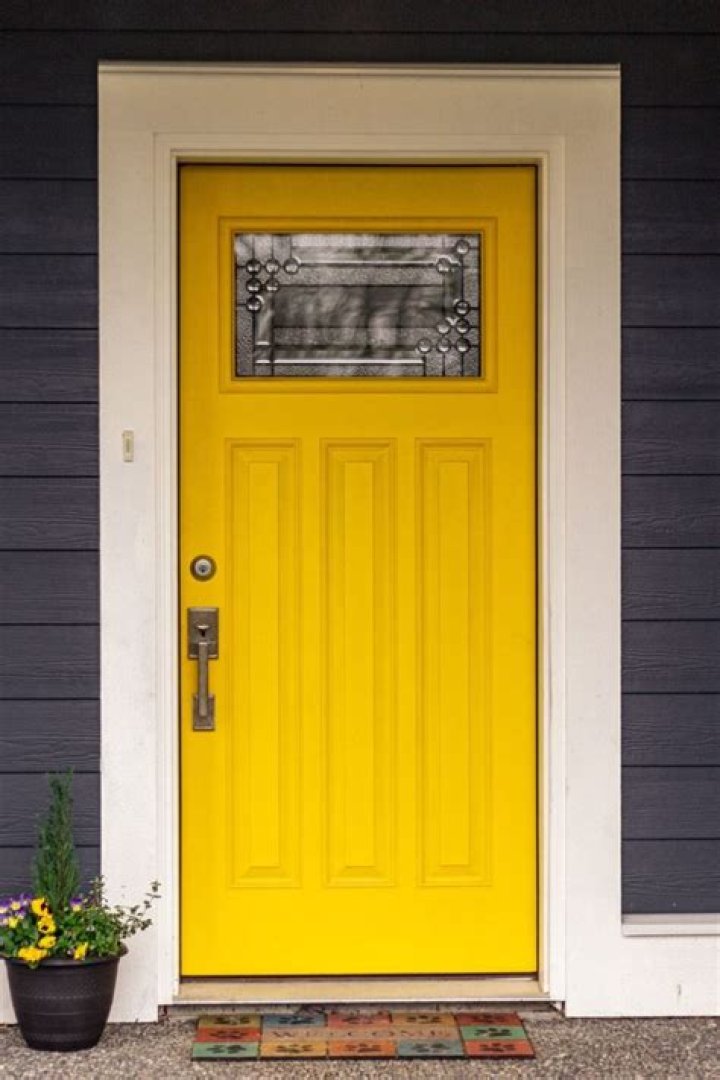 What does a yellow front door mean?