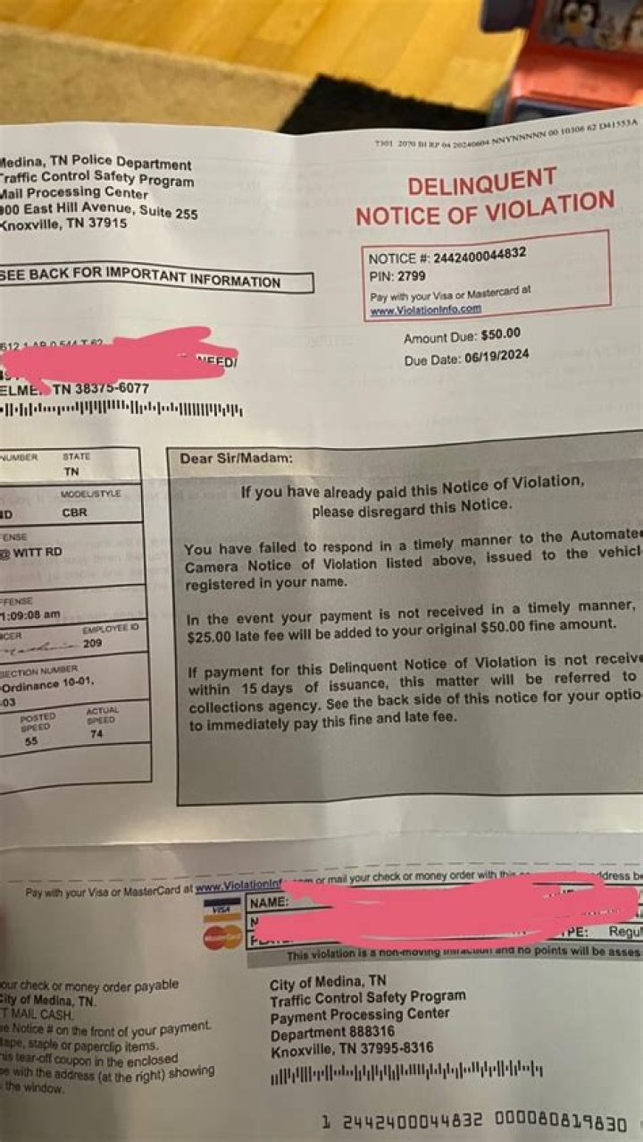 Will I get a red light ticket for going over the white line but still stopped UK?